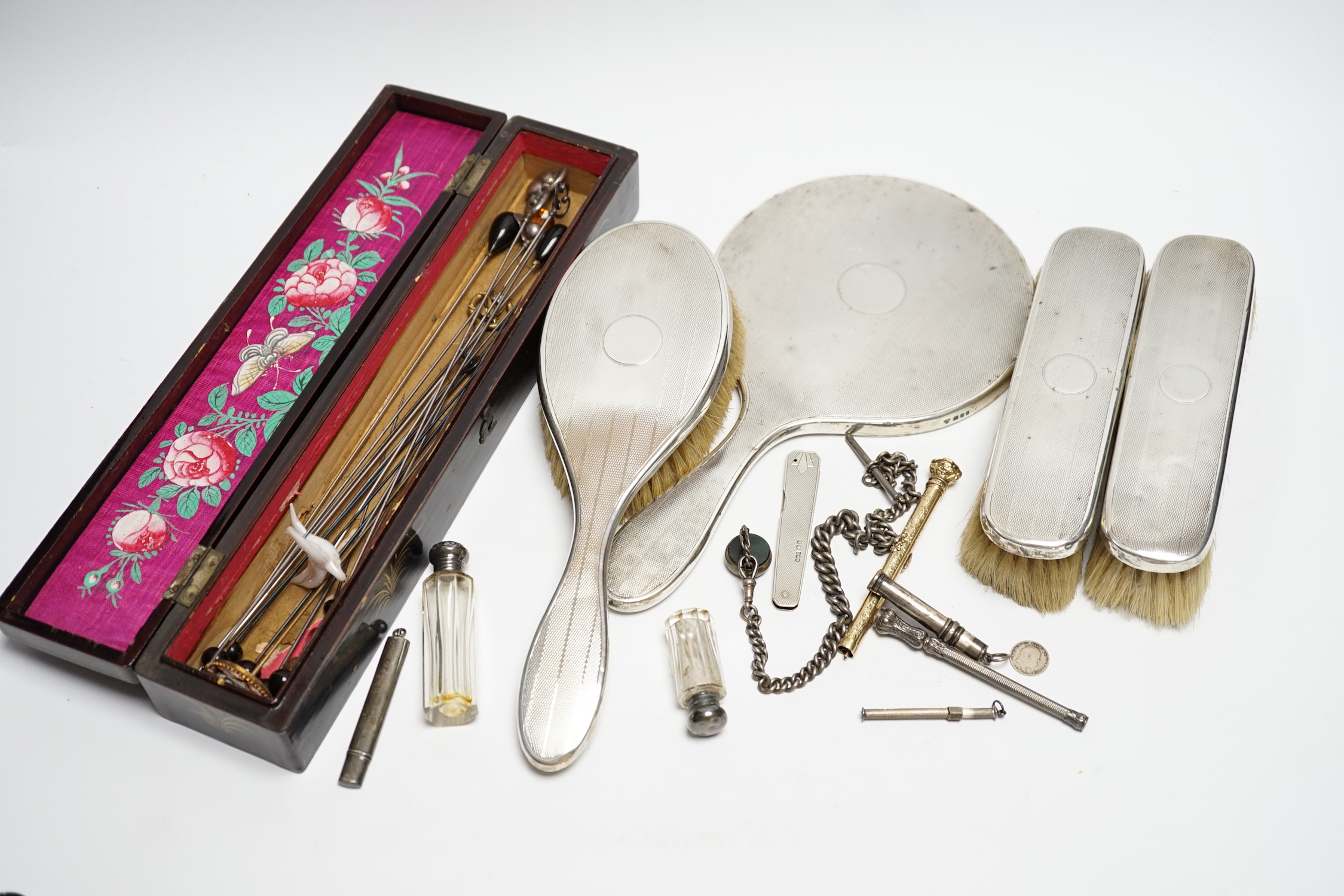 Sundry silver and other items including a four piece mirror and brush set, propelling pencils, silver albert and hatpins including three silver by Charles Horner.